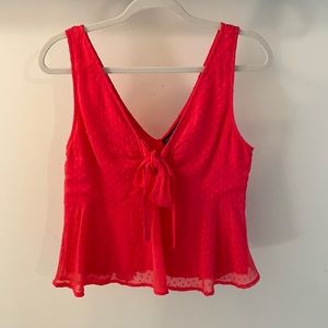 Red ruffle tank with bow front detail